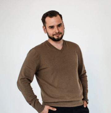 Bearded male in brown sweater