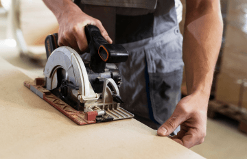 carpenter cutting wood